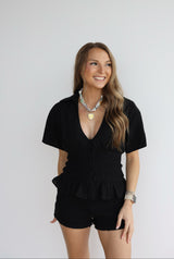 DEEP VNECK RUFFLE ROMPER