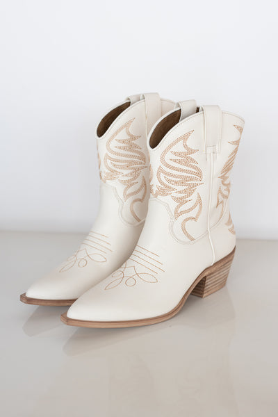 cowboy boot with beige stitching