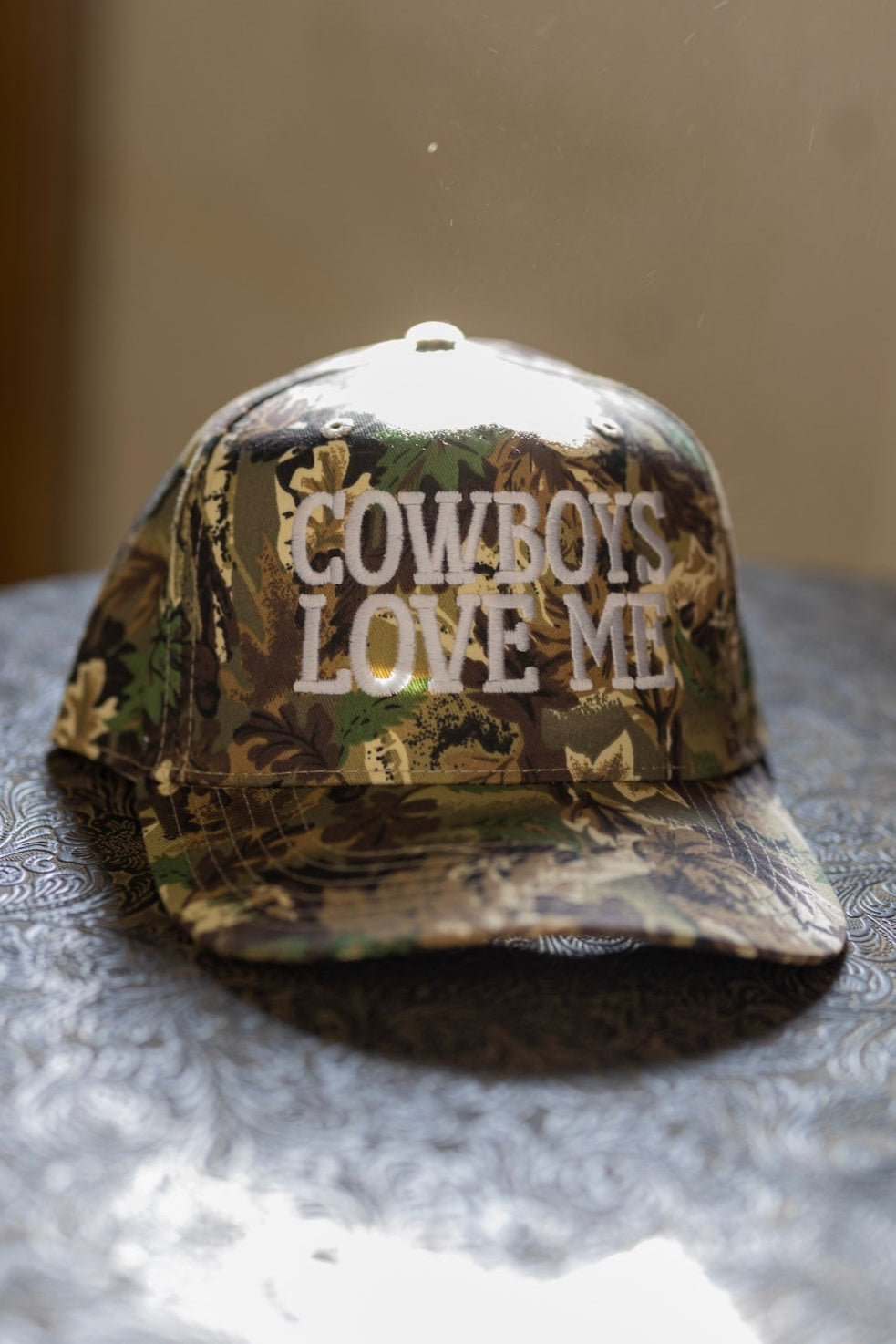 COWBOYS LOVE ME TRUCKER HAT