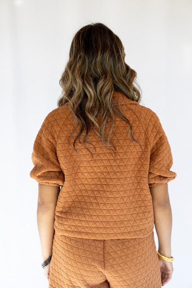 QUILTED BUTTON PUFF TOP