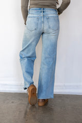 High Rise Jagged Raw Hem Jean