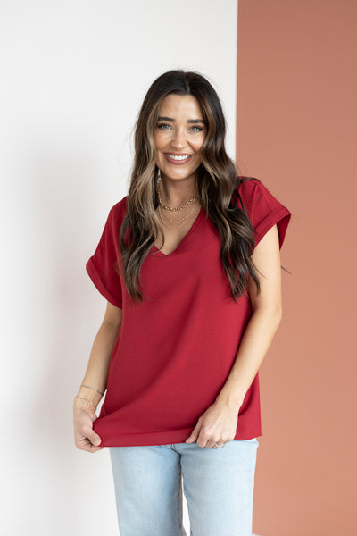 SOLID WOVEN VNECK TOP
