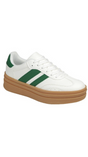 White sneaker with green stripes and brown sole on a white background
