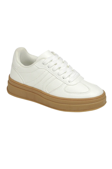 White sneaker with a brown sole on a white background