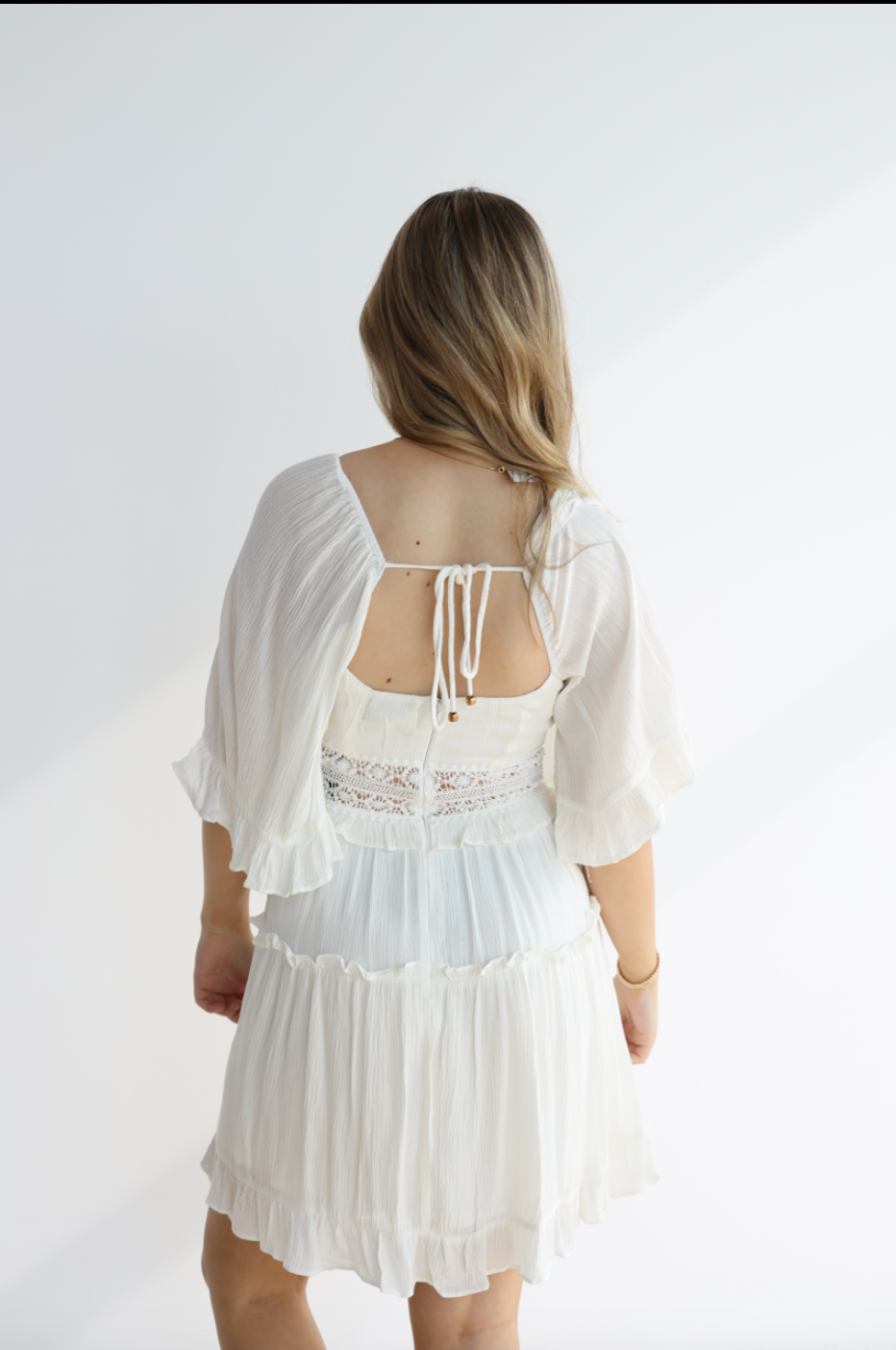 ILA FLUTTER RUFFLE DRESS