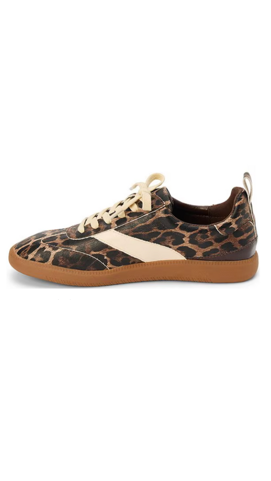Sneaker with leopard print pattern on a white background