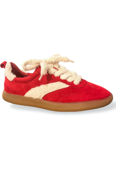 Red sneaker with white laces on a white background