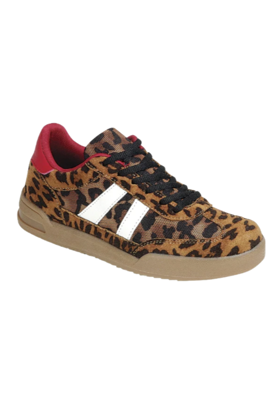 Sneaker with leopard print pattern and red interior on a white background