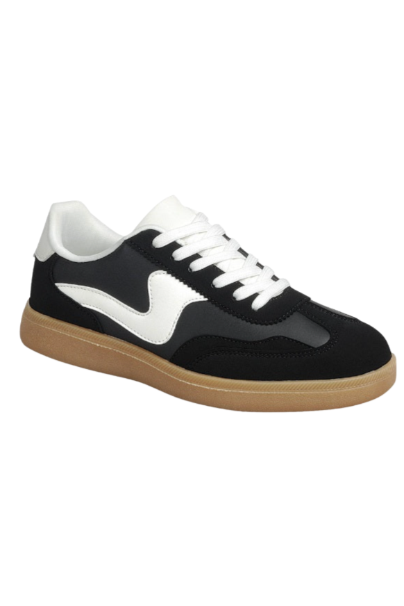 Black and white sneaker with a brown sole on a white background